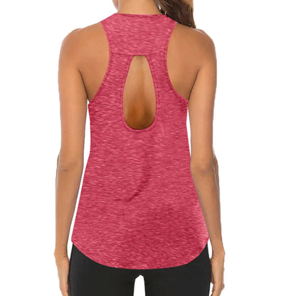 Pink tank top with open back worn by a person on a white background