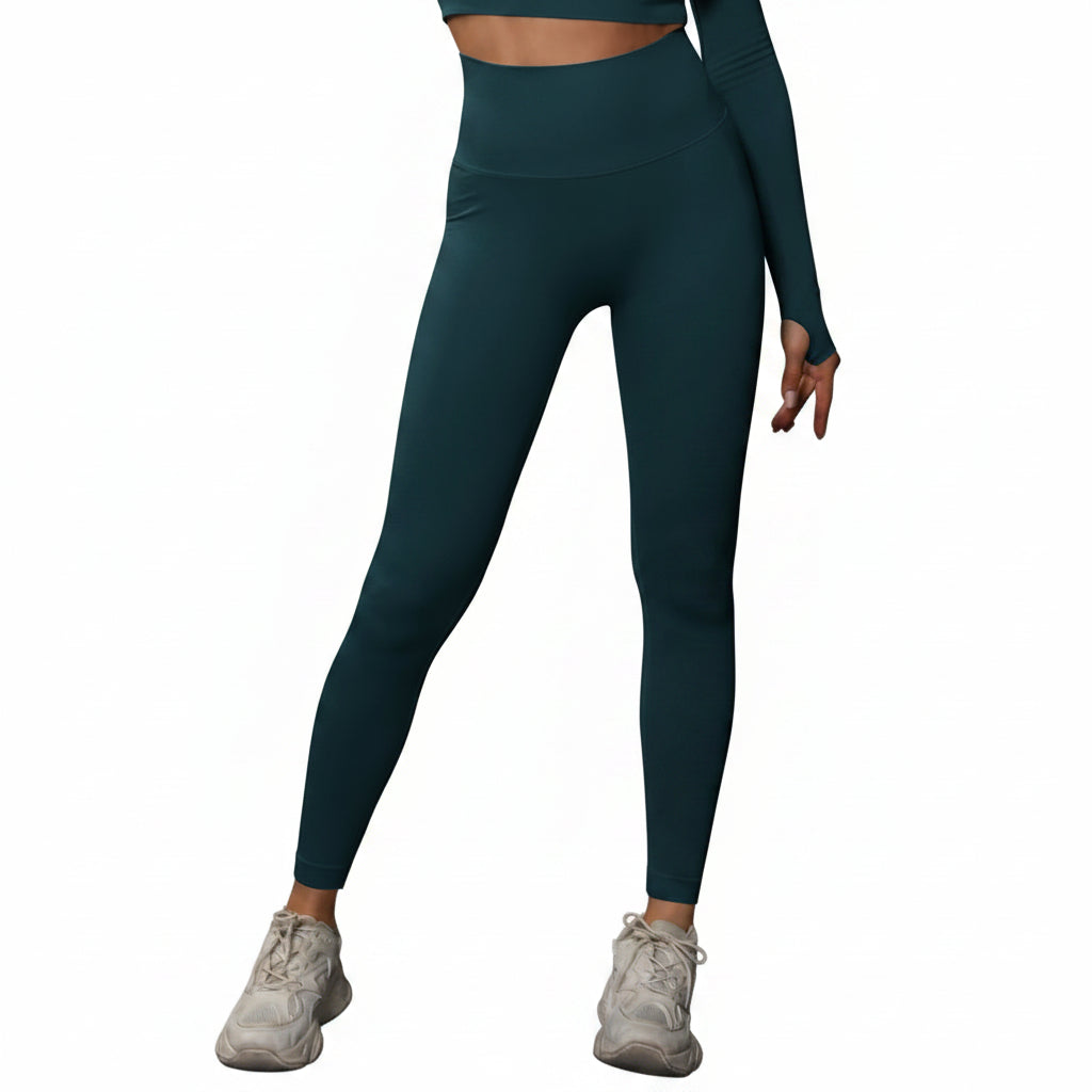 Person wearing teal athletic leggings and a matching top 