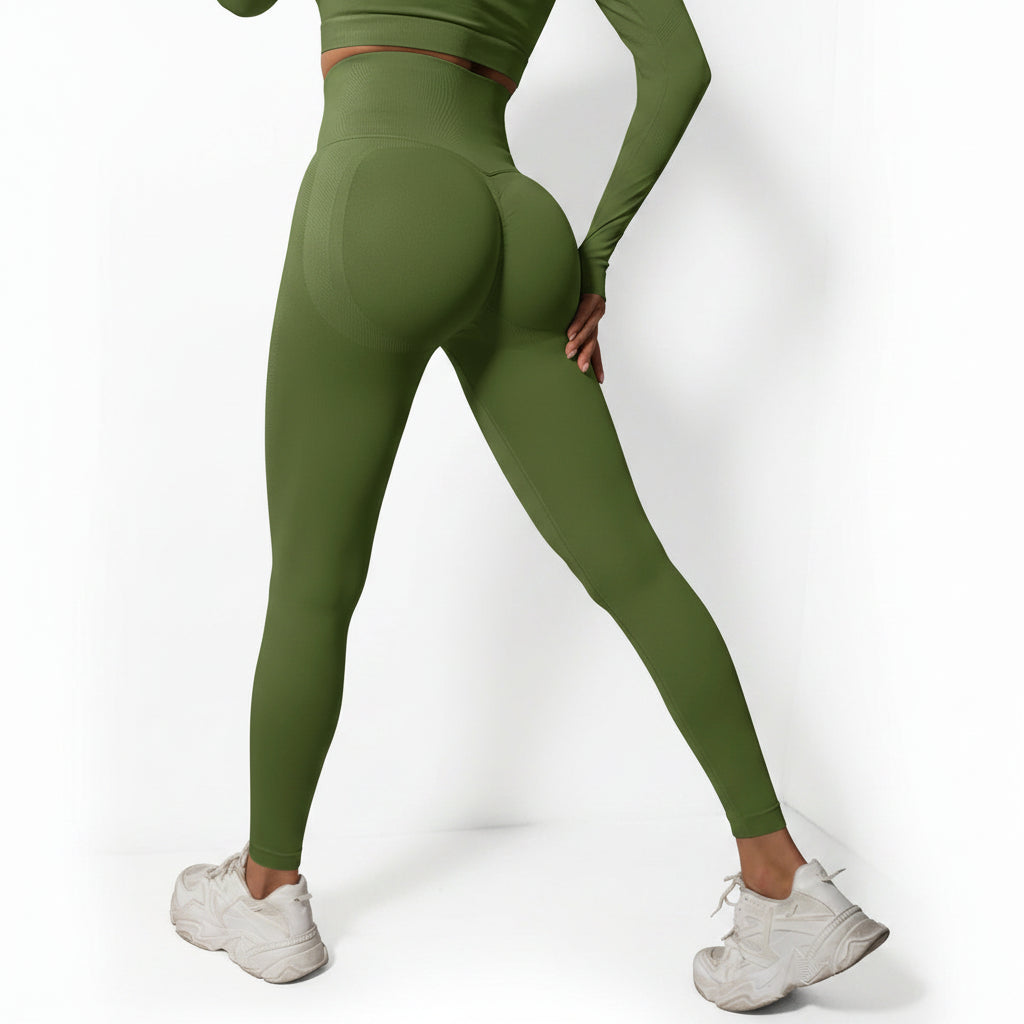 Person wearing green leggings and white sneakers