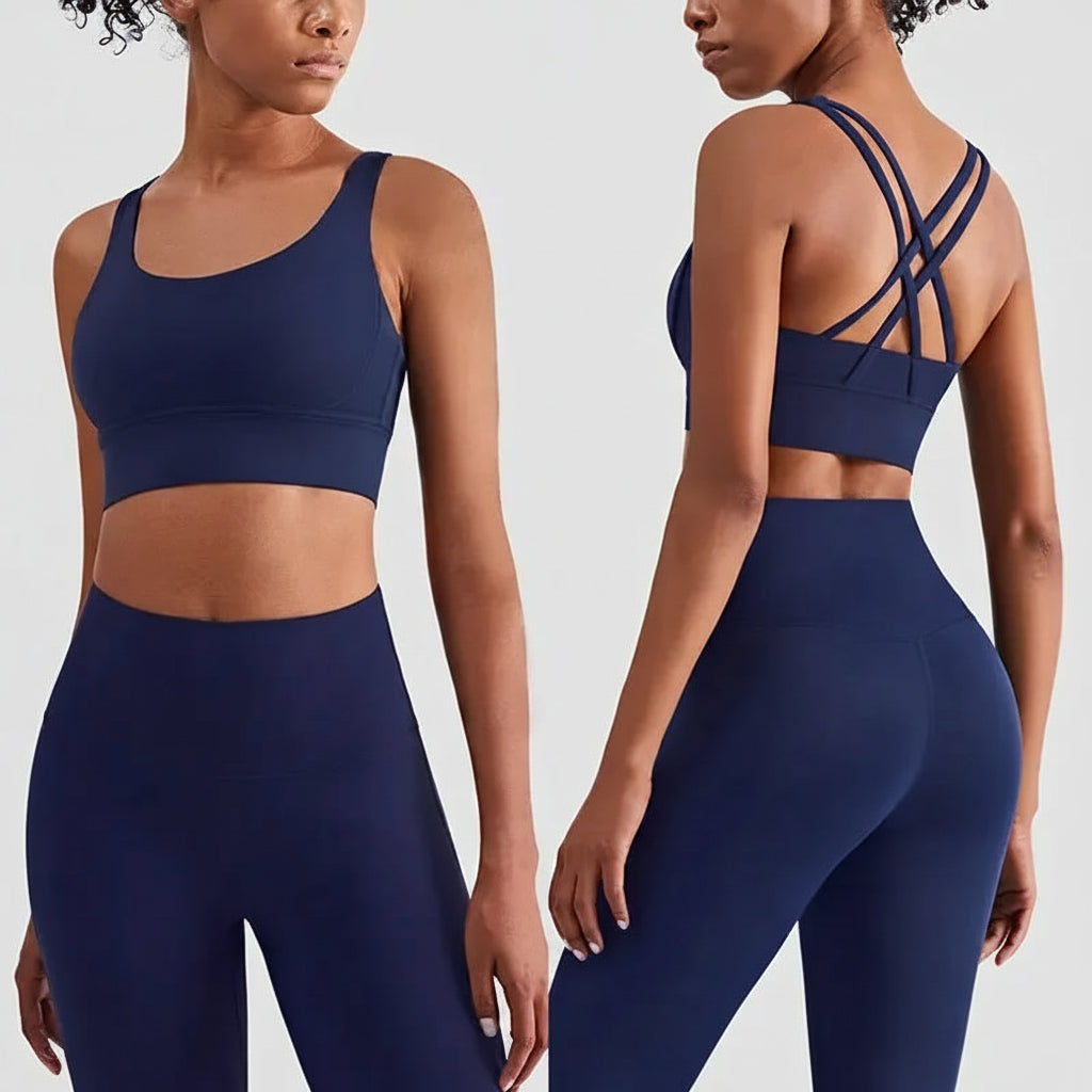 Navy blue sports bra and leggings set on a model