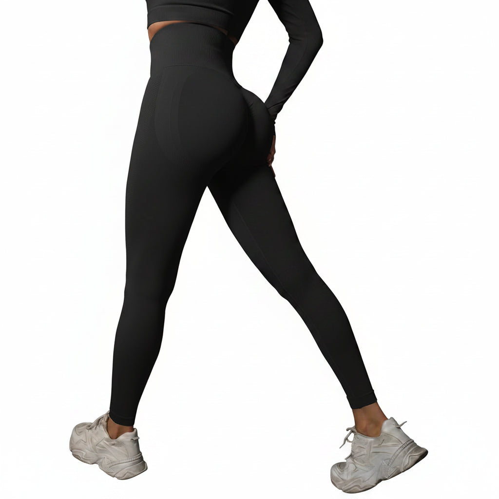 Person wearing black leggings and white sneakers 