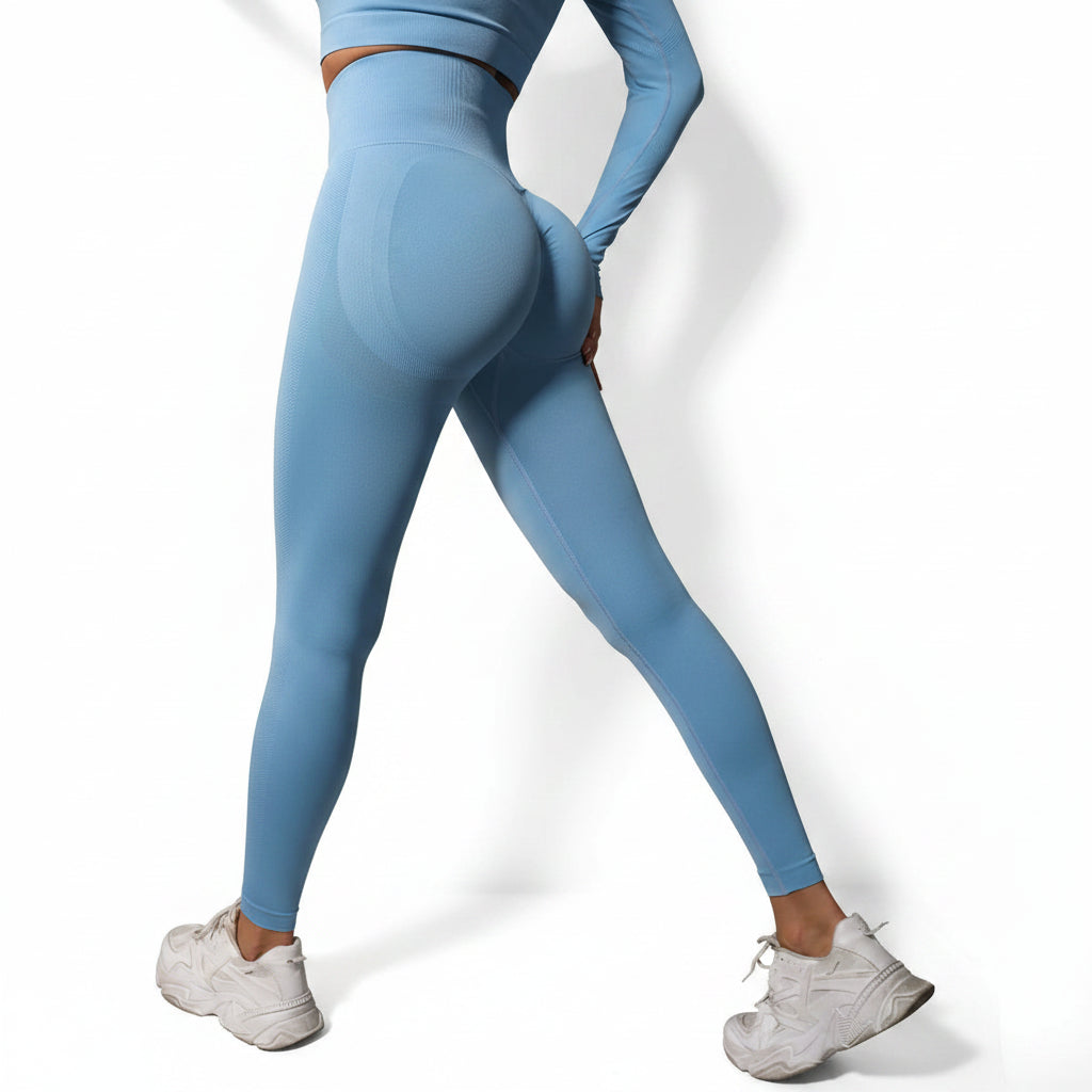 Person wearing blue leggings and white sneakers