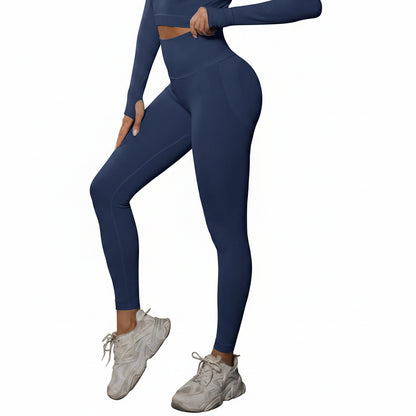 Person wearing a blue athletic outfit with white sneakers