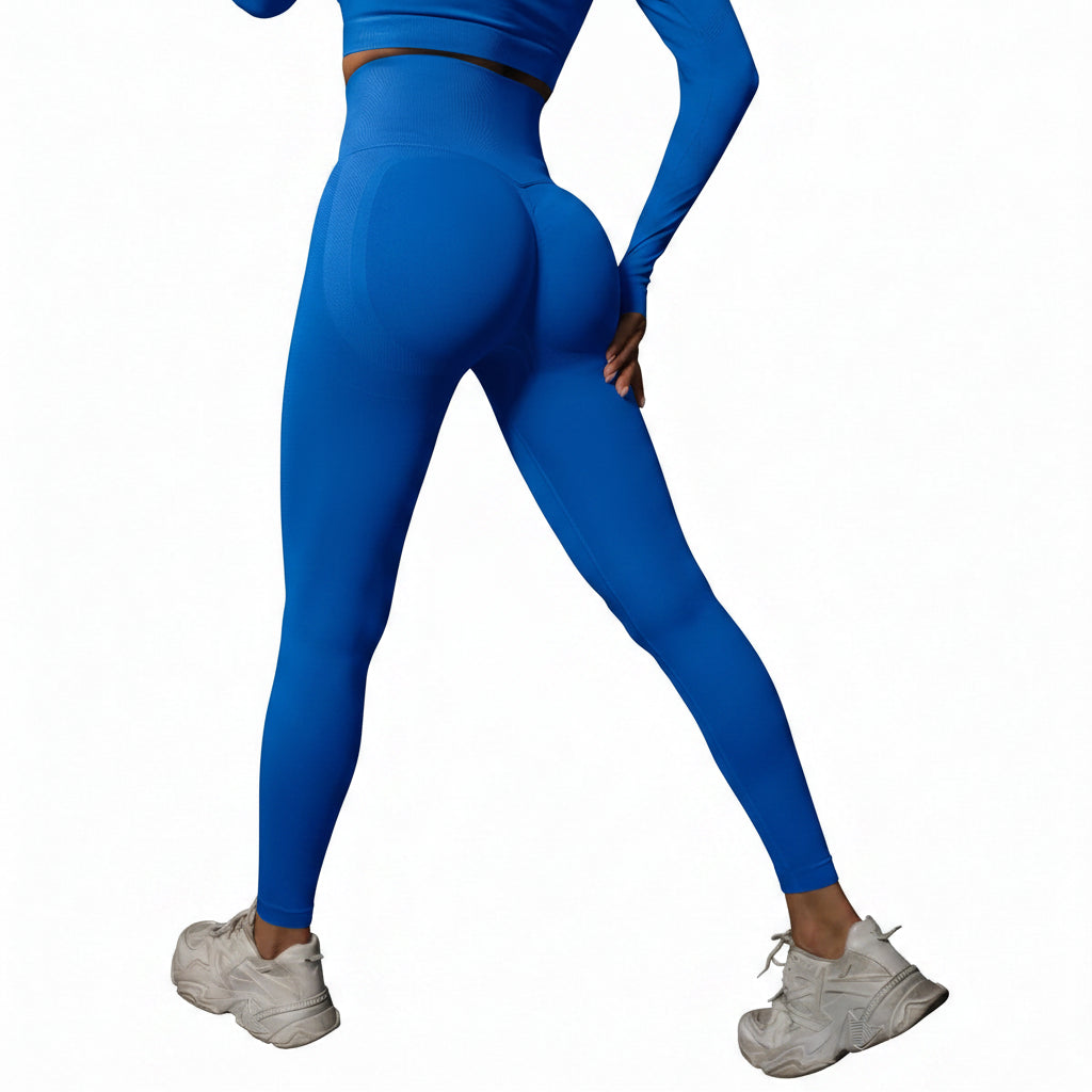 Person wearing blue leggings and white sneakers 