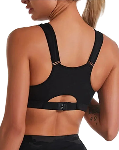 Black sports bra worn by a model on a white background