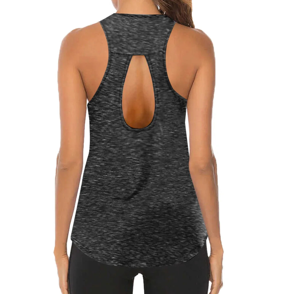 Black tank top with open back worn by a person on a white background