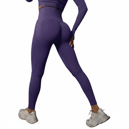 Person wearing purple athletic leggings and white sneakers