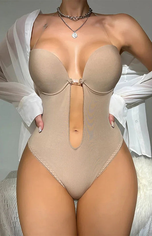 Beige bodysuit with cut-out design on a white background, accompanied by black and beige versions.
