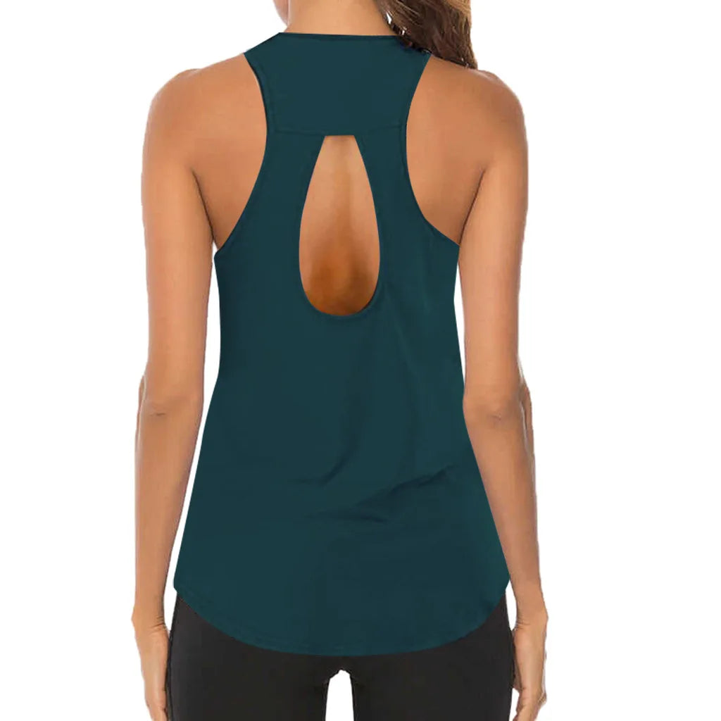 Teal tank top with open back worn by a person on a white background