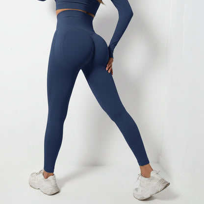 Person wearing blue leggings and white sneakers