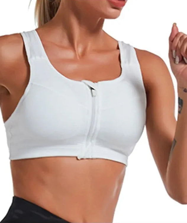 White sports bra worn by a person on a white background