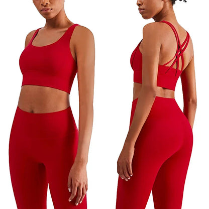 Red sports bra and leggings set on a white background